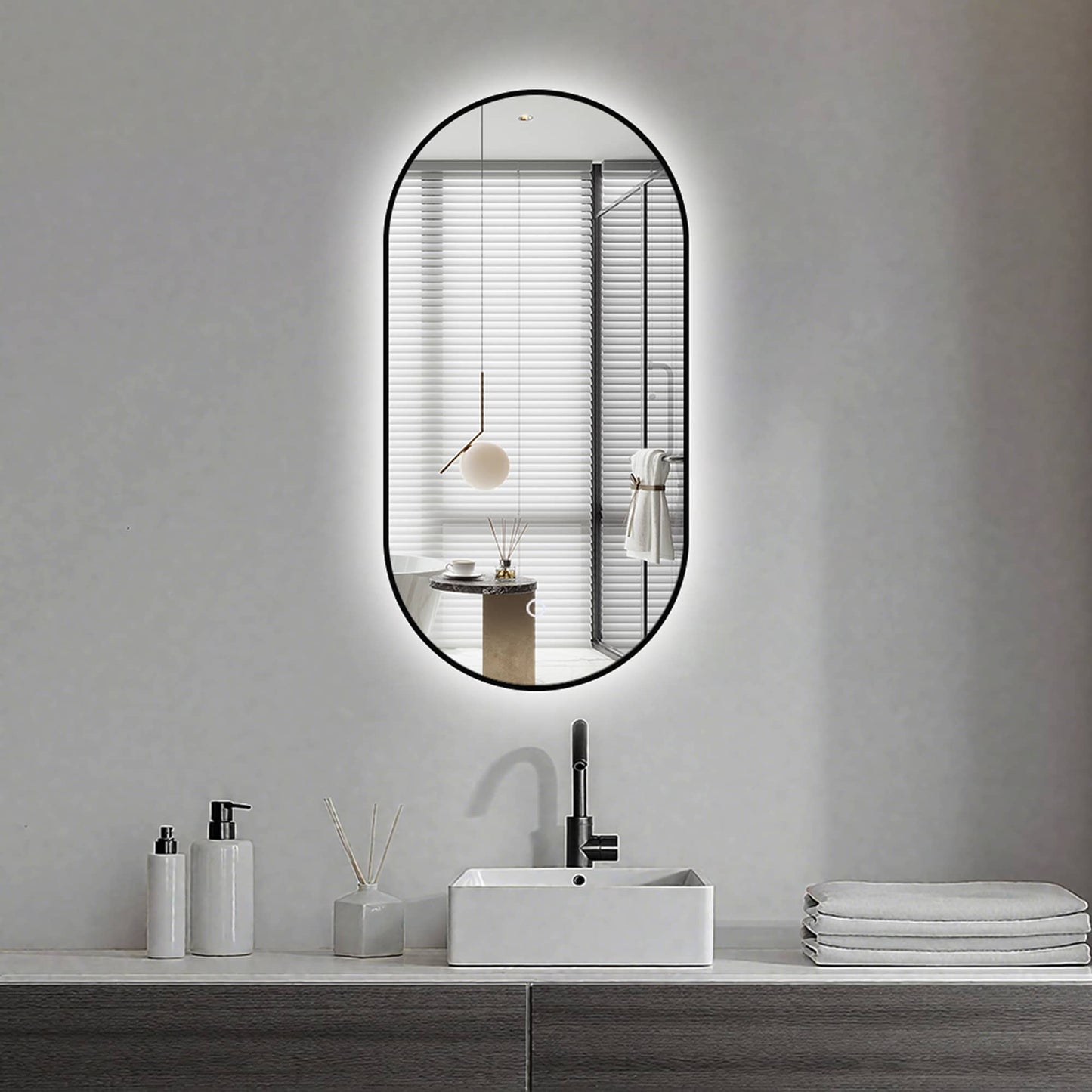 Espejo de baño ovalado con iluminación ambiental LED regulable